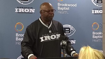 Head coach Tim Lewis speaks to reporters after his Birmingham Iron won its first-ever game at Legion Field. Lewis has had extensive experience as an assistant coach at the NFL, but he hasn’t served as a head coach at any level of the game. (Source: Robert Carter)