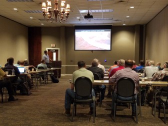 Site planners and designers participate in a workshop about sediment and erosion control. 
