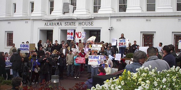 https://wbhm.org/wp-content/uploads/2014/06/immigrationprotest.jpeg