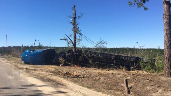 An 18-wheeler wraps around a tree in one of the worst hit areas of Beauregard. This is down Lee Road 39, which is what some residents now call "death alley."