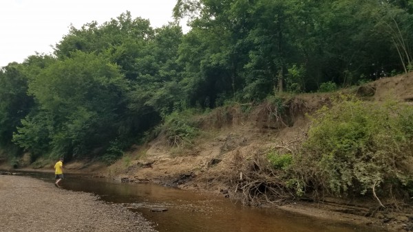 Riverkeeper David Butler walks along a section of the Cahaba River in Hoover that's been especially impacted by erosion and sediment loading.