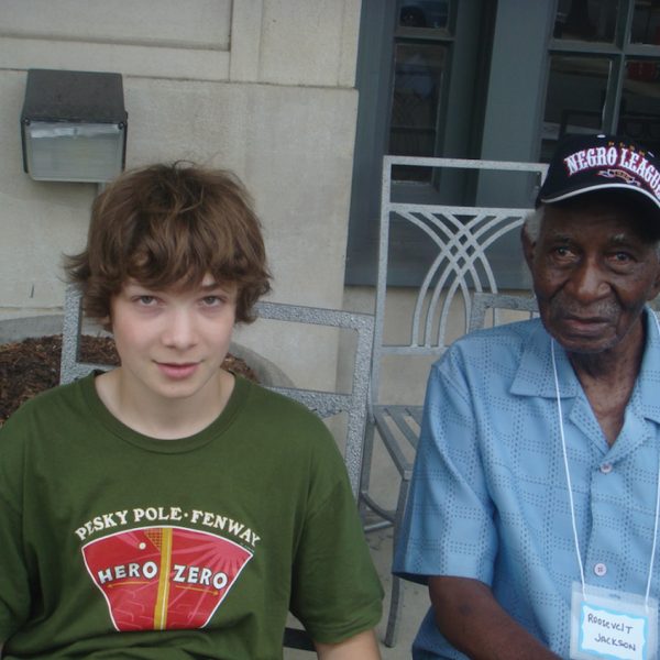 https://wbhm.org/wp-content/uploads/2021/03/Cam_Perron_with_player_Roosevelt_Jackson-600x600.jpg