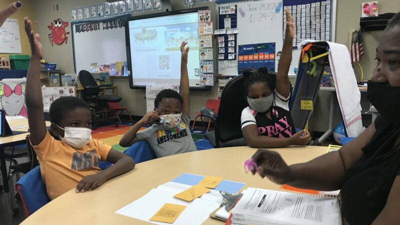 Lisa Mobley teaches her Kindergarten students phonic sounds at West End Academy's summer literacy camps.