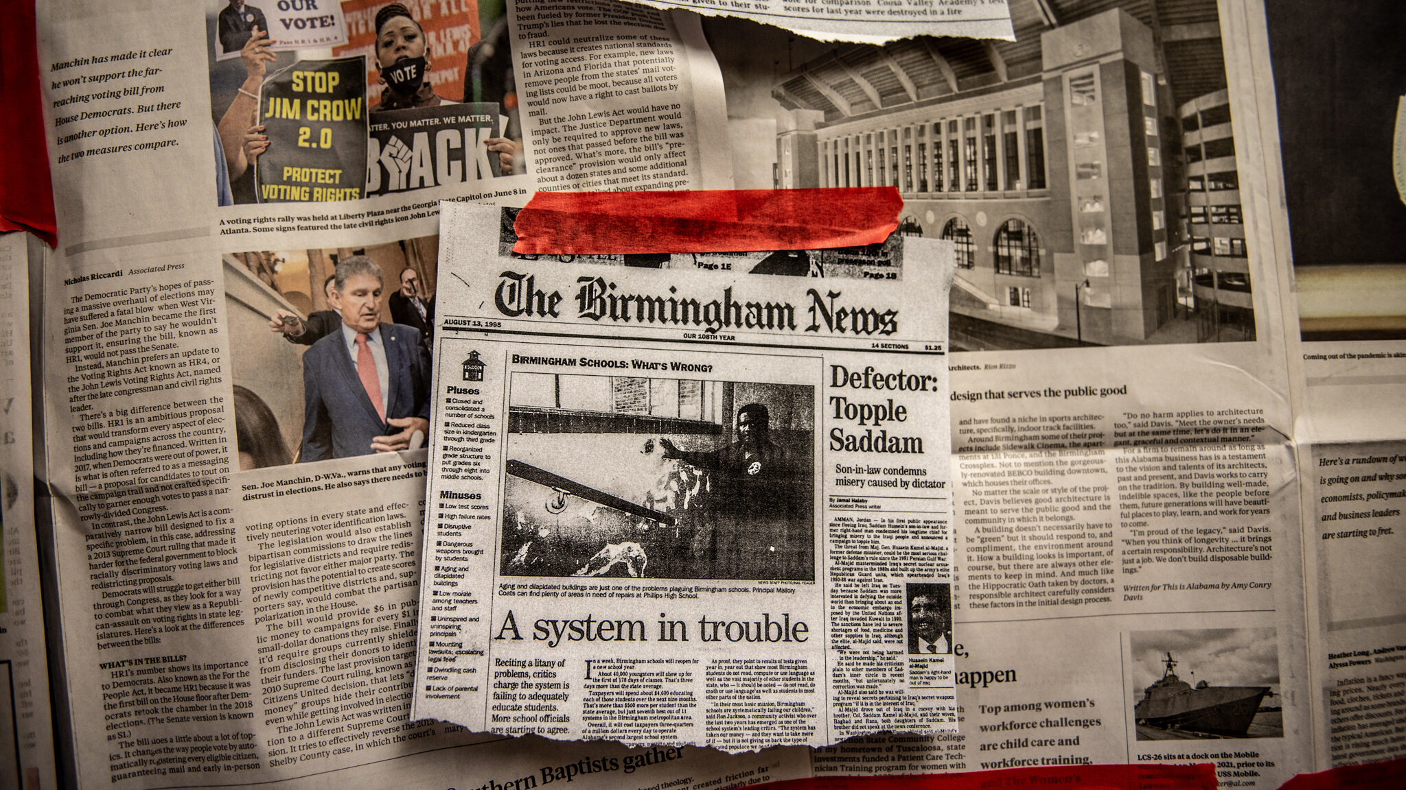 Articles about Birmingham public schools were displayed during the "All-In" interactive art exhibit at Ramsey High School.