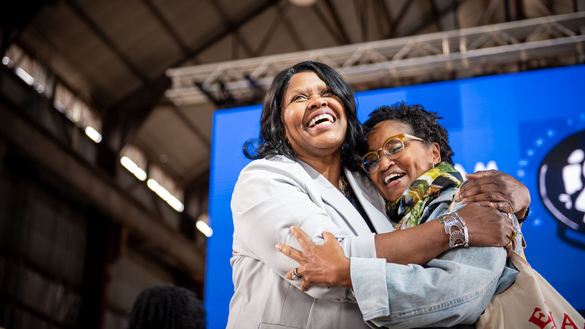 Sephira Shuttlesworth greets an IACP attendee during the conference's Table Talk session on food and civil rights.