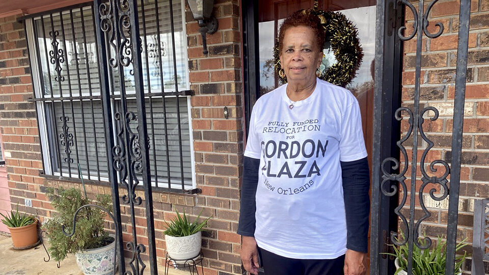 Lydwina Hurst stands in front of her home, purchased in the 1980s, in Gordon Plaza, a neighborhood built on a former toxic landfill.