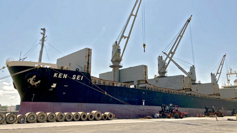 A cargo ship carrying steel coils sits docked at the Port of Mobile in Mobile, Alabama.