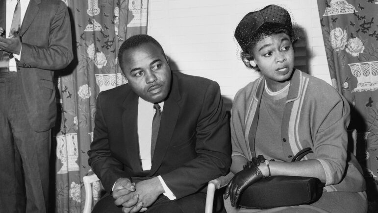Christopher McNair, center left, and Maxine McNair, center right, parents of Denise McNair, one of four African American girls who died in a church bombing in Birmingham, Ala., Sept. 15, hold press conference at a hotel, Sept. 20, 1963, New York. Mr. McNair, a professional photographer, said the U.S. should stop worrying about its image abroad and clean up house in America. The man on the left is unidentified. (AP Photo)