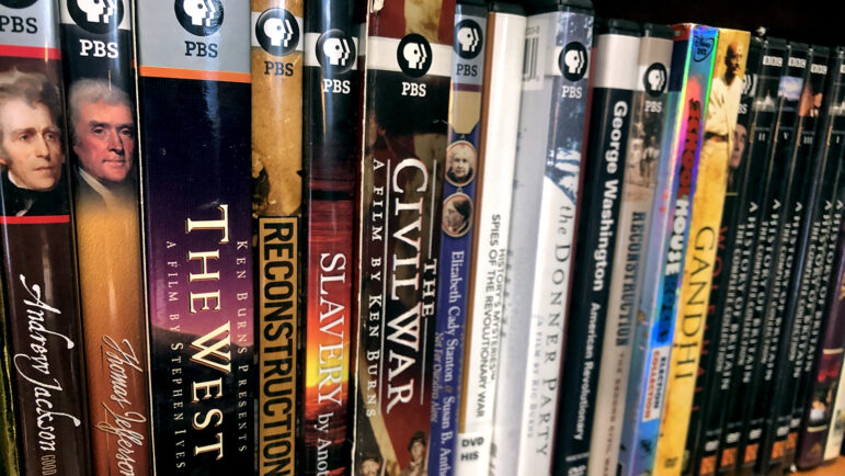 DVDs featuring different time periods in American history line the shelves of Annemarie Gray’s classroom at the Alabama School of Fine Arts.