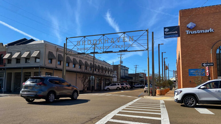 Cars pass through an intersection in downtown Brookhaven, Mississippi
