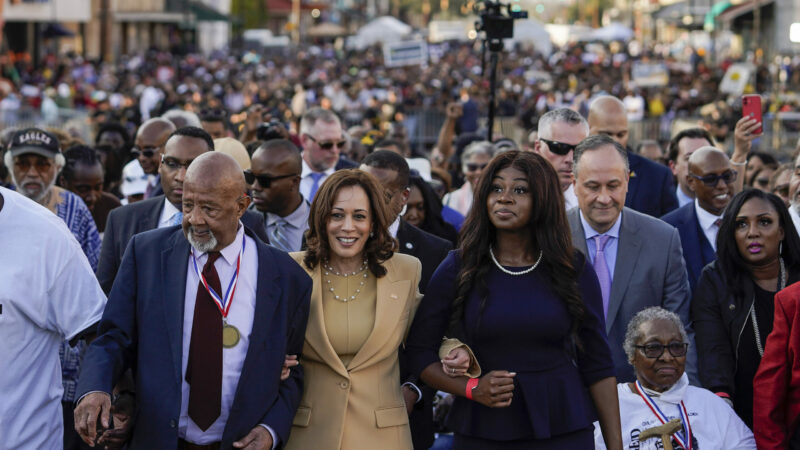 Vice President Kamala Harris marches on the Edmund Pettus Bridge after speaking in Selma, Ala., on the anniversary of "Bloody Sunday," a landmark event of the civil rights movement, Sunday, March 6, 2022. (AP Photo/Brynn Anderson)