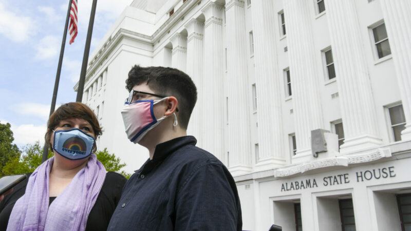 Transgender rights advocates rally at the Alabama Statehouse on March 30, 2022