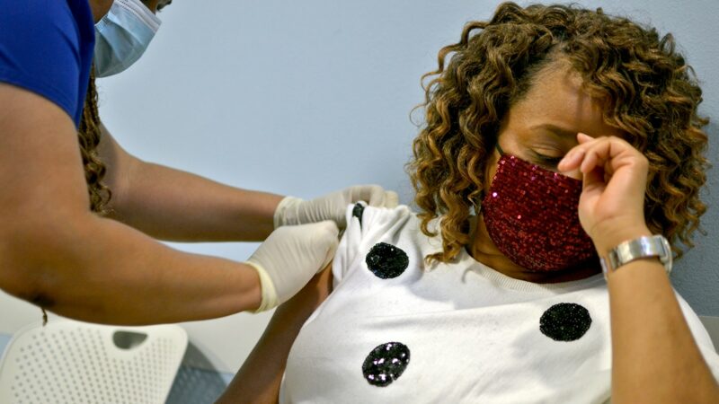 Tonya Beamon, of Renova, Mississippi, receives a COVID-19 vaccine at Delta Health Center, March 3, 2021.
