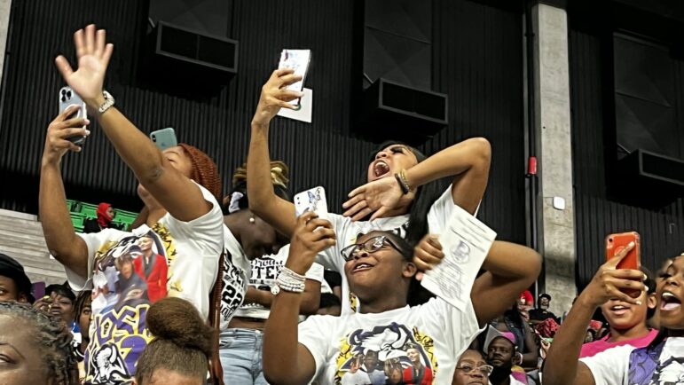 Families wore t-shirts with their graduates' face on them and cheered when their name was called.