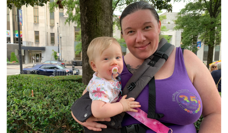 Brittney Barnett stands with her daughter Saphira after the rally for reproductive rights at Linn Park in Birmingham. (Photo by Miranda Fulmore, WBHM)