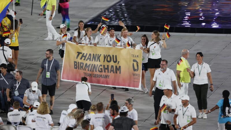 Athletes from Germany hold a sign thanking Birmingham at The World Games closing ceremony