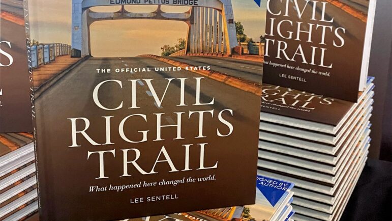Signed copies of The Official U.S. Civil Rights Trail book sit on a store shelf at Birmingham-Shuttlesworth International Airport.