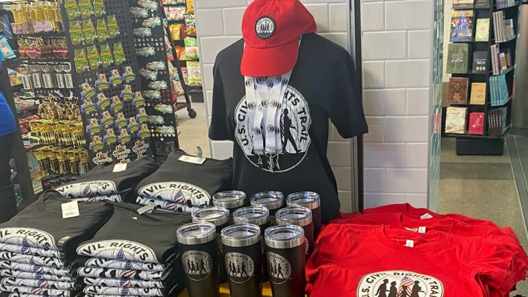 Apparel like hats, mugs and t-shirts are for sale at the U.S. Civil Rights Trail Market at Birmingham-Shuttlesworth International Airport.