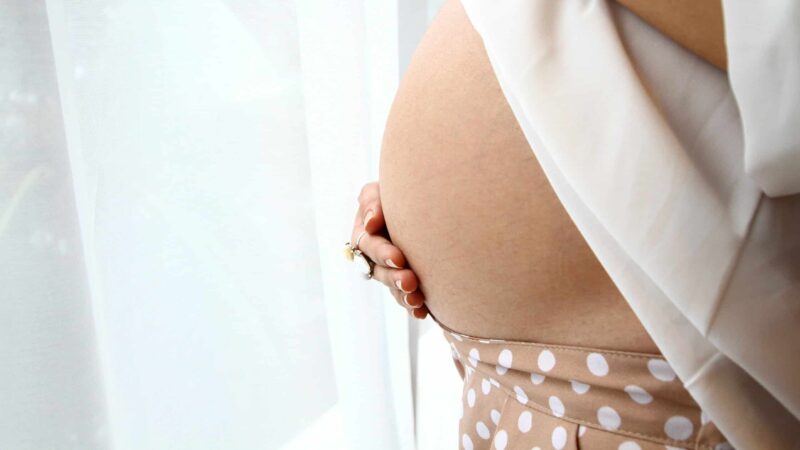 A stock photograph of a pregnant woman.