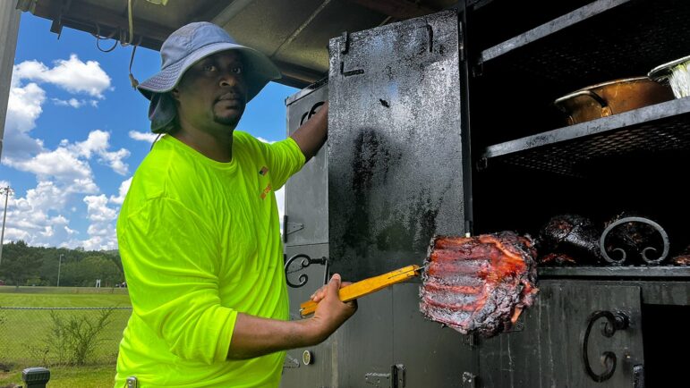 Andrew Ward smoked ribs for 8 hours just for Colony Day in Colony, Alabama, Aug. 6, 2022.