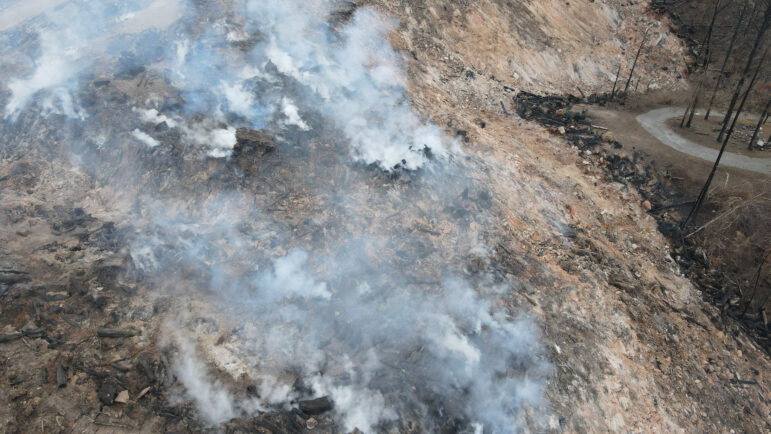 An arial photo shows smoke billowing from an underground fire at an environmental landfill near Birmingham, Alabama.
