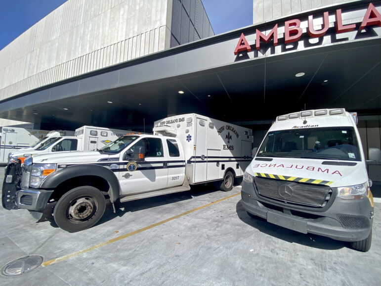 Ambulances are lined up outside the wall of the University Medical Center trauma center in New Orleans.