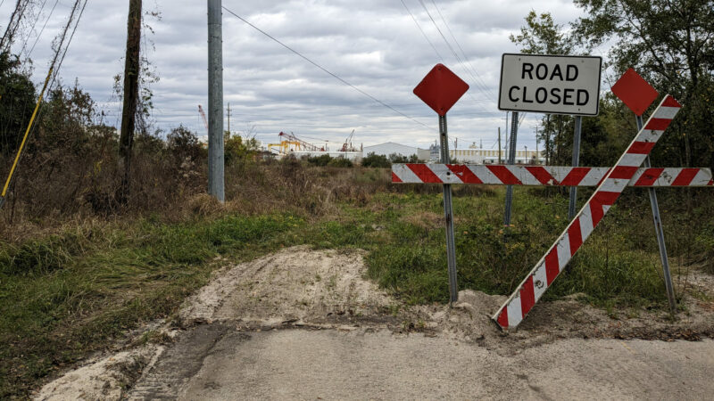 A portion of a Pascougla, Mississippi shipyard is visible from a now-closed road near Barbara Weckesser’s home in the Cherokee Forest subdivision neighborhood, pictured on December 17, 2022.