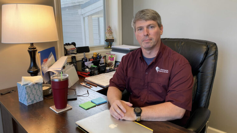 Ray Campbell is seated in his office at Life Choices Pregnancy Care Center in Columbus, Mississippi, Jan. 4, 2023.