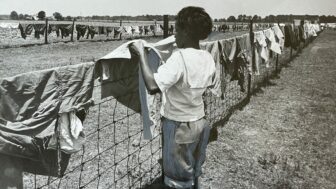 In this archive photo, a child does laundry at Alabama Industrial School for Negro Children in 1969.