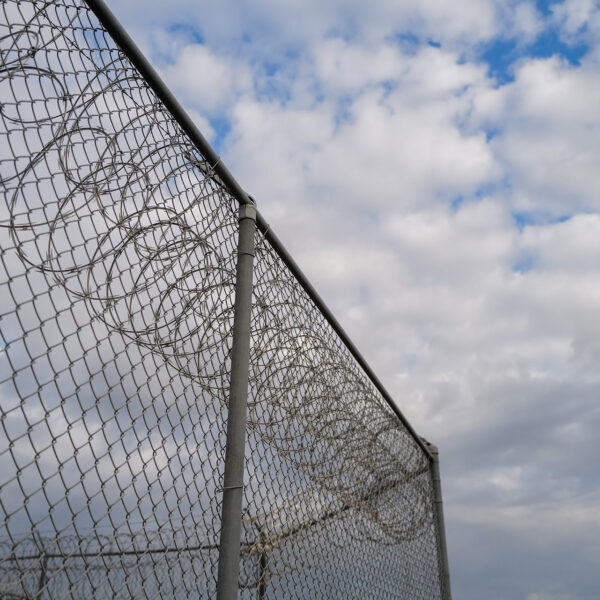 https://wbhm.org/wp-content/uploads/2023/02/Prison_Barbed_Wire_Stock_Photo-600x600.jpg