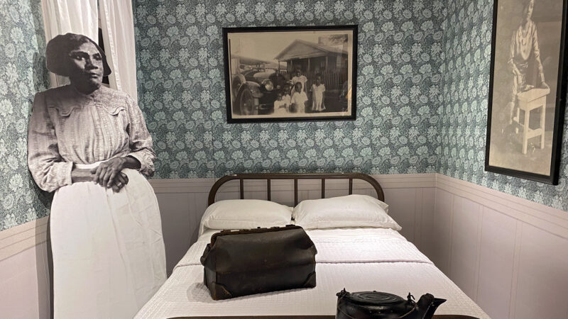 A section of the Scott Ford House Permanent Exhibit shows how granny midwives facilitated home births in rooms similar to the one shown here at the Smith Robertson Museum and Cultural Center in Jackson, Mississippi, on Feb. 11, 2023.