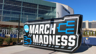 A sign reading "March Madness" sits outside Birmingham's Legacy Arena.