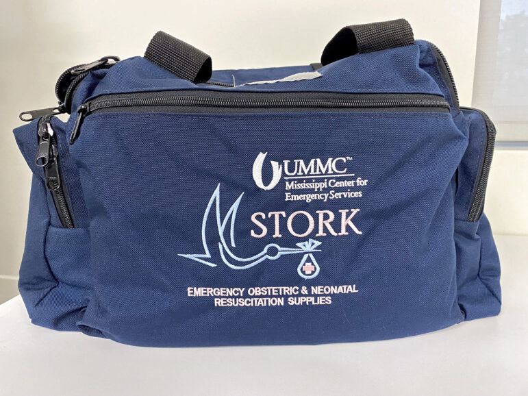 The STORK bag is filled with everything for a neonatal emergency, including warming blankets, oxygen bags for CPR and a manual for medicines and procedures — which is also available through a cell-phone app.