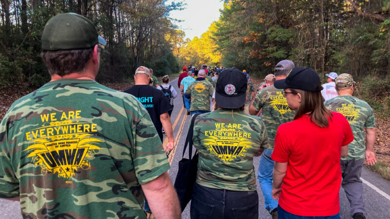 Striking miners and supporters march to the entrance of one of Warrior Met Coal’s mines in Brookwood, Alabama, November 9, 2022.
