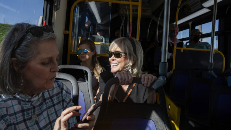 Laura Cottingim enjoys the sun and a ride over the Mississippi River on a New Orleans Regional Transit Authority bus on Jan. 19, 2023, in New Orleans, Louisiana.