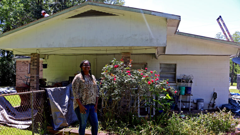 Karen Ellis poses for a portrait in the backyard of her family’s home in Loxley, Alabama, on April 20, 2023.