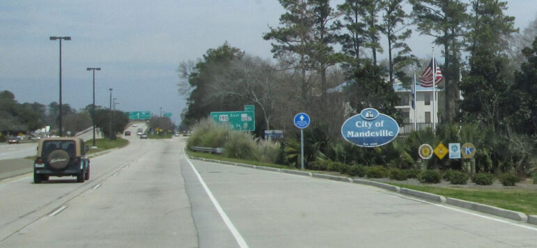 A view of a City of Mandeville welcome sign is seen when getting off of the Lake Pontchartrain Causeway Bridge coming from New Orleans on June 2, 2023.
