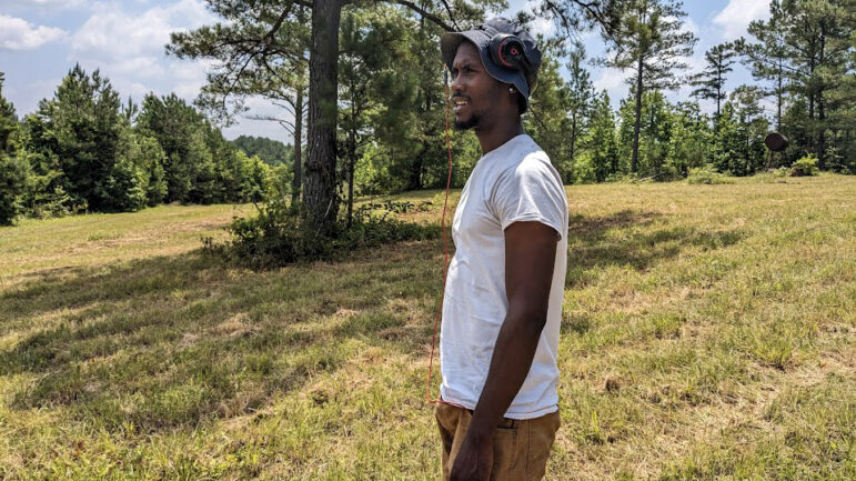 Markel Thompson stands on his family’s farm in McCool, Mississippi on June 20, 2023.