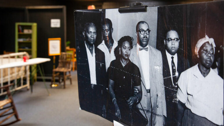 (from left) A large photo of Walter Reed, Willie Reed, Mamie Till-Mobley, Charles Diggs, Dr. T.R.M. Howard and Amanda Bradley at the trial for Emmett Till’s murder stands inside of the Mound Bayou Museum of African American Culture and History in Mound Bayou, Mississippi.