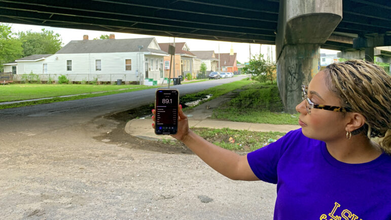 Jacquelynn Mornay shows a noise reading taken beneath the Claiborne Expressway on July 18, 2023, in New Orleans.