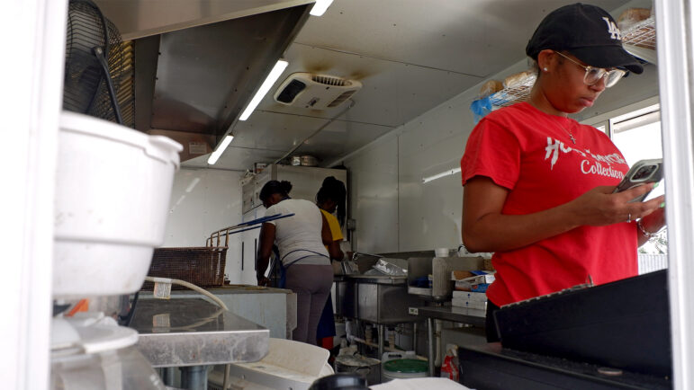 Chuck’s Dairy Bar employees working out of the restaurant's temporary food truck prepare to close for the day in Rolling Fork, Mississippi, on Sept. 20, 2023.