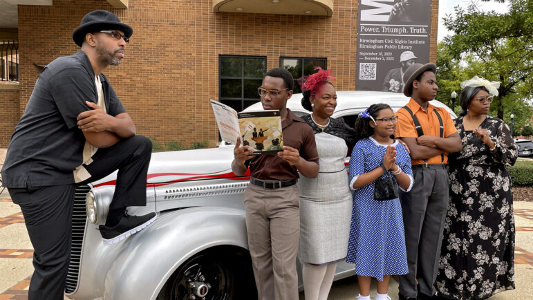 A group of actors poses as the Watson family from Christopher Paul Curtis’ “The Watsons Go to Birmingham” outside of the Birmingham Civil Rights Institute on Sept. 14, 2023.