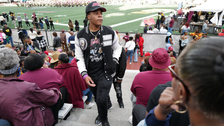 A fan walk up the bleachers inside Legion Field Staium at the 2022 Magic City Classici in Birmingham, Alabama. Today, the latest streetwear fashion trends are front and center at the annual HBCU rivalry game.