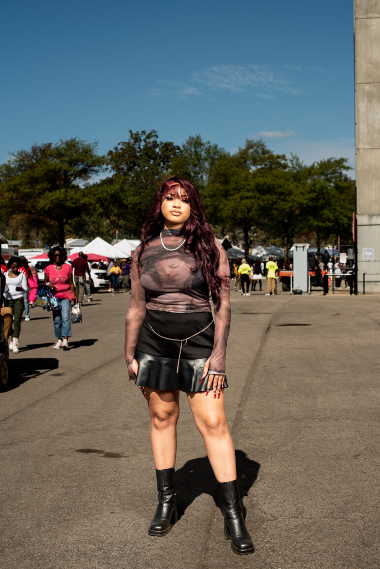 India Hairston wears a graphic tee and leather accented skirt at the Magic City Classic in Birmingham, Alabama, U.S., on Saturday October 28th 2023.