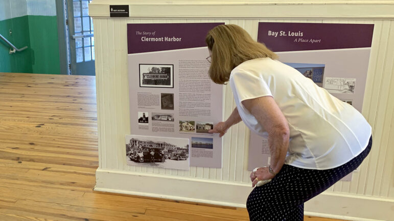 Lolie Kull, of Clermont Harbor, points to a display at the Ground Zero Museum in Waveland, Mississippi, on Tuesday, August 29, 2023.