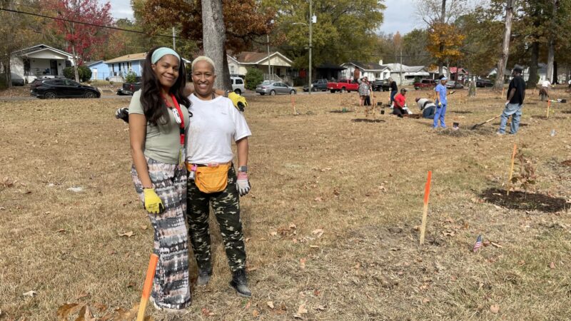 Britany Patrick and Traci Carlisle, both employees of the Birmingham VA, volunteered with Cool Green Trees to help plant trees at Lynn Park.