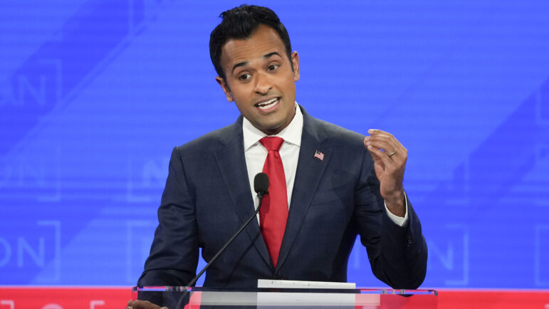 Republican presidential candidate businessman Vivek Ramaswamy gestures during a Republican presidential primary debate at the University of Alabama.