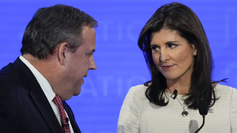 Republican presidential candidates, former New Jersey Governor Chris Christie talking with former U.N. Ambassador Nikki Haley during a commercial break at a Republican presidential primary debate hosted by NewsNation on Wednesday, December 6, 2023, at the Moody Music Hall at the University of Alabama.