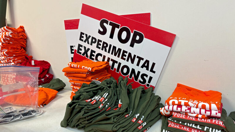 Signs and t-shirts handed out by Death Penalty Action sit on a table inside the Unitarian Universalist Church in Birmingham, Alabama, on Wednesday, Jan. 24, 2024.