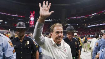 In this AP file photo, Alabama head coach Nick Saban leaves the field after the Southeastern Conference championship NCAA college football game between Georgia and Alabama, Saturday, Dec. 4, 2021, in Atlanta.